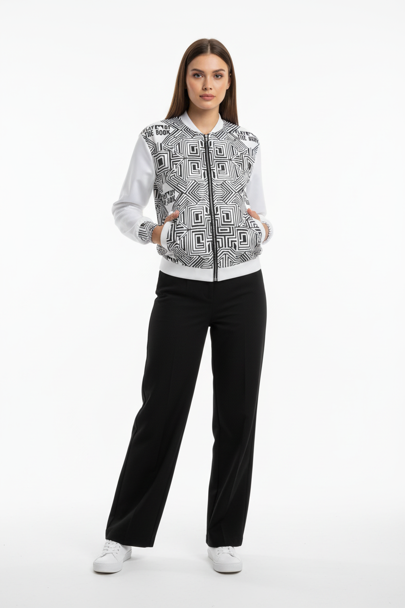 Female model in wide-leg pants and white sneakers