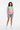 Female model - zipped bomber with denim shorts