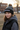 Girl age 11 wearing grey and black beanie