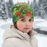 Girl age 6 wearing dinosaur jungle beanie