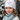 Girl age 8 wearing castle beanie