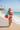 Girl Running with Beach Ball