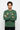 Green sweatshirt arms crossed