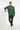 Green sweatshirt leaning pose