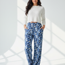 Model 1 - Front view of blue camo wide-leg pants
