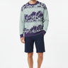 Tropical palm sweater with navy shorts for summer coastal style