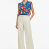 Geometric tribal vest with wide-leg trousers for contemporary polished style
