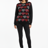 Geometric hearts sweater with black jeans for modern casual aesthetic