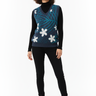 Tropical palm vest over black turtleneck for statement look
