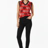 Bold hearts vest with black jeans for modern casual aesthetic