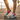 Latino male model white shoes beach