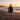 Male model - Beach with surfboard at sunset