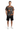 Male model in black athletic shorts and white sneakers