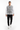Male model in black sweatpants and white sneakers
