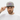 Man wearing heather grey and navy snapback, looking at camera