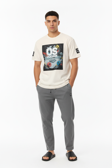 Natural cream tee with grey joggers and slides