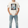 Natural cream tee with hands in pockets