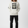 Oatmeal heather hoodie with long hair model, hands in pocket