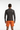 Rash guard with orange boardshorts back
