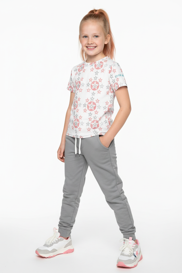 Red-haired child in athletic wear