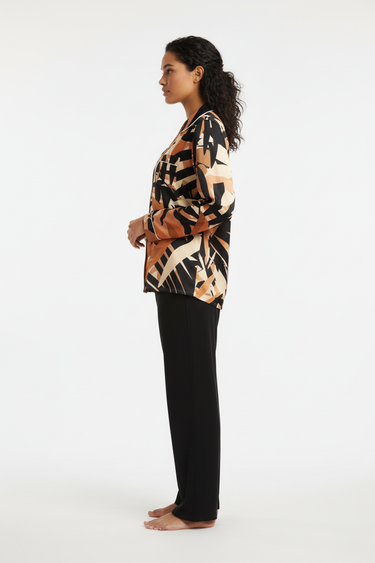 Side profile with black pants