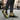 South Asian male model white shoes city