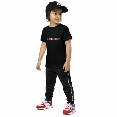 T-shirt with track pants and baseball cap