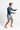 Wave Contour Rash Guard with grey board shorts side view